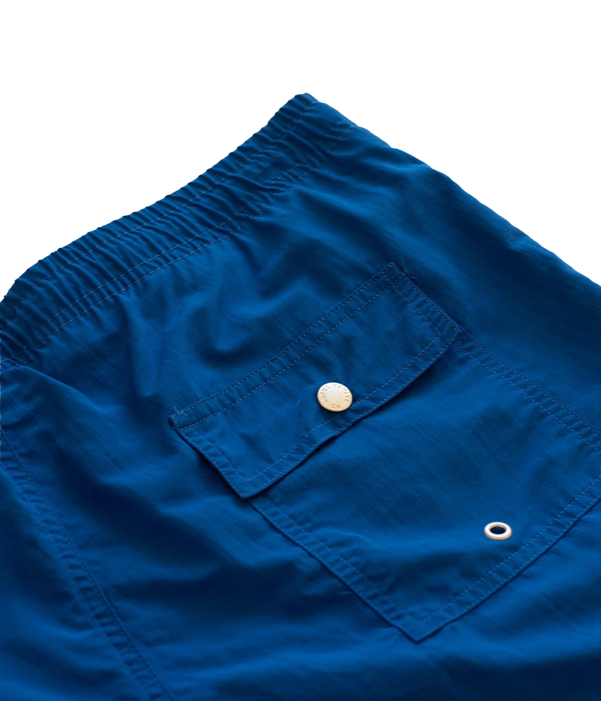 Close-up of Bather swim trunks’ fabric, showcasing the smooth, quick-dry 100% recycled polyester material. The ultra-fine mesh lining offers a soft, barely-there feel with four-way stretch for optimal mobility.