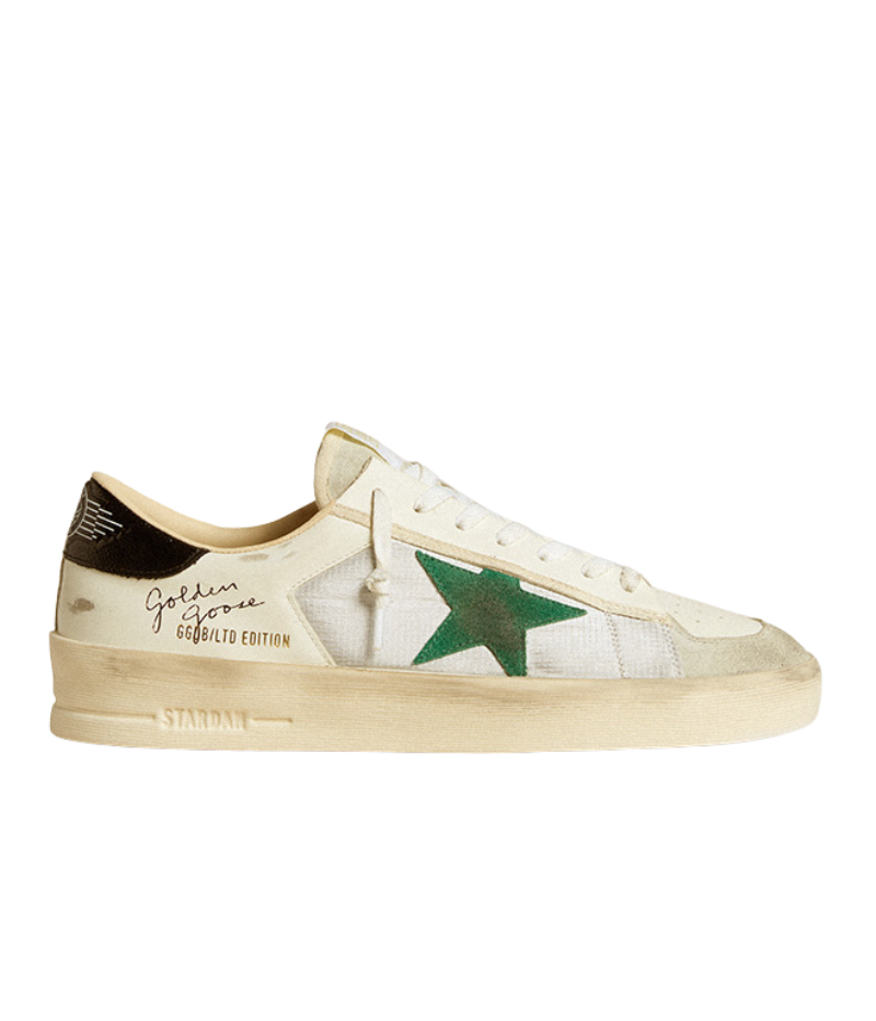 Golden Goose Stardan Sneaker in Silver and Green, featuring a silver leather upper with green star and heel accents. Designed for durability and comfort, this Italian-made sneaker blends modern style with luxury craftsmanship, perfect for elevating casual and polished looks alike.