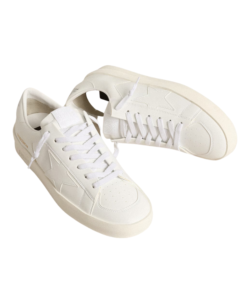 White Golden Goose Stardan sneakers in 100% cowhide leather, featuring a retro 90s basketball-inspired design. Minimalist all-white finish for a versatile, everyday look. Made in Italy.