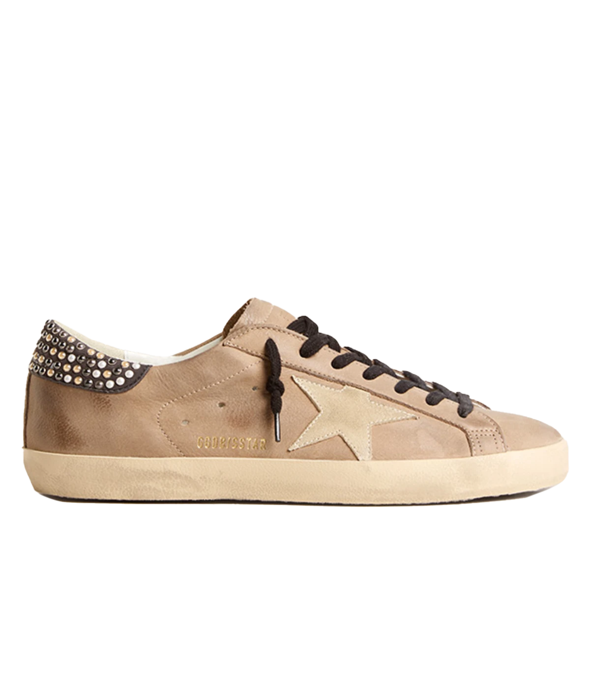 Side profile of Golden Goose studded sneakers, highlighting the luxe suede star, pearl stud embellishments, and handcrafted distressed finish.