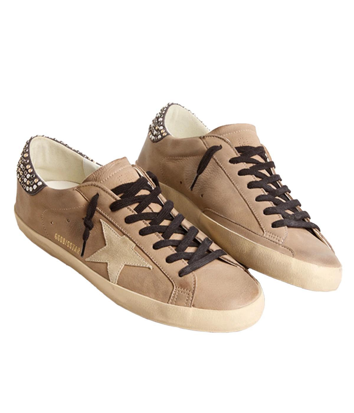 Iconic Golden Goose sneakers in premium cow leather, featuring pearl studs, a suede star detail, and a distressed rubber sole for a chic, vintage-inspired look.