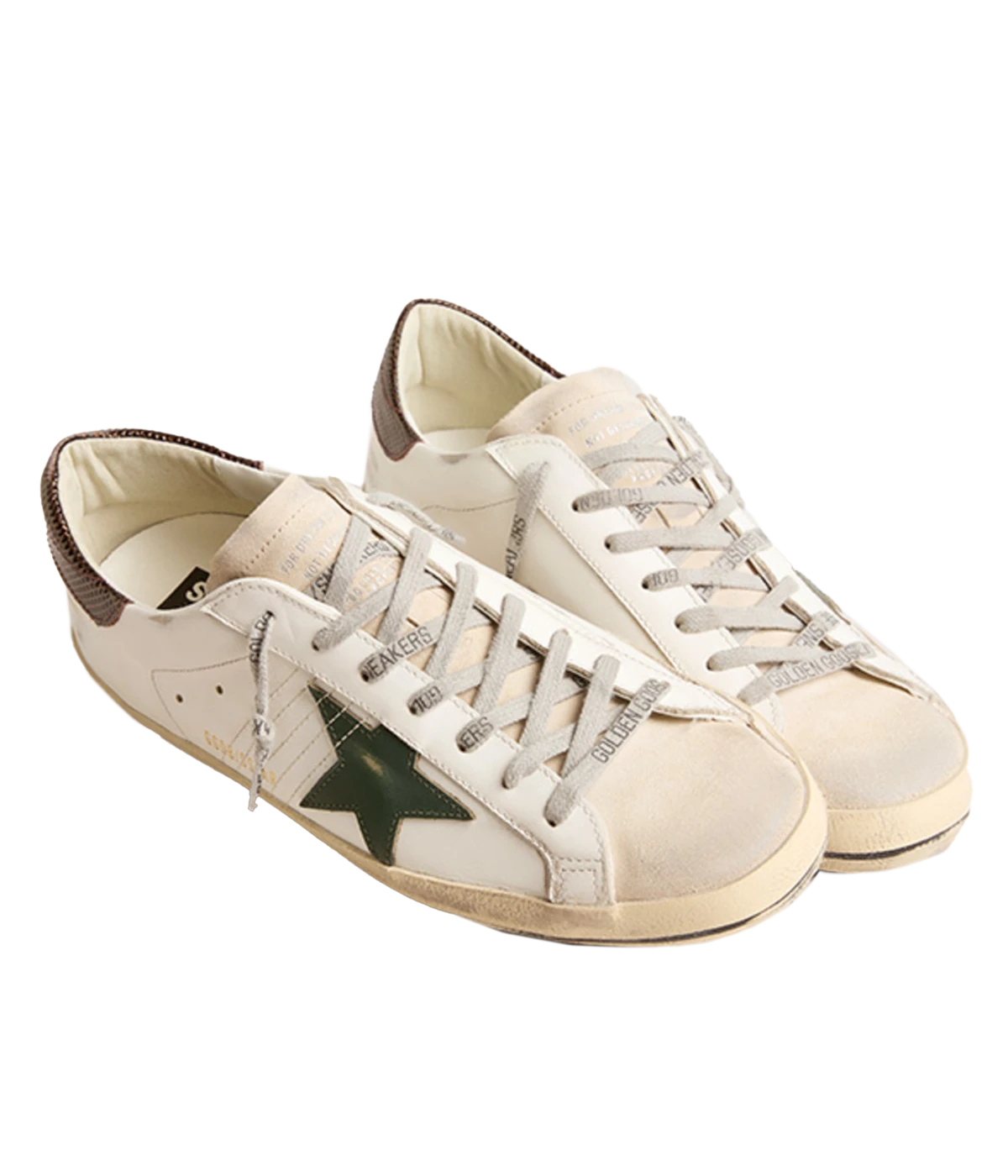 A pair of Golden Goose Super Star Sneakers in white, seed pearl, green, and brown, featuring the brand's signature distressed finish for a relaxed, worn-in look. The sneakers include a signature star patch on the sides and a contrasting green and brown heel counter. Designed with a front lace-up fastening, round toe, and flat rubber sole, these sneakers are perfect for everyday wear, offering a mix of style, comfort, and signature Golden Goose flair.