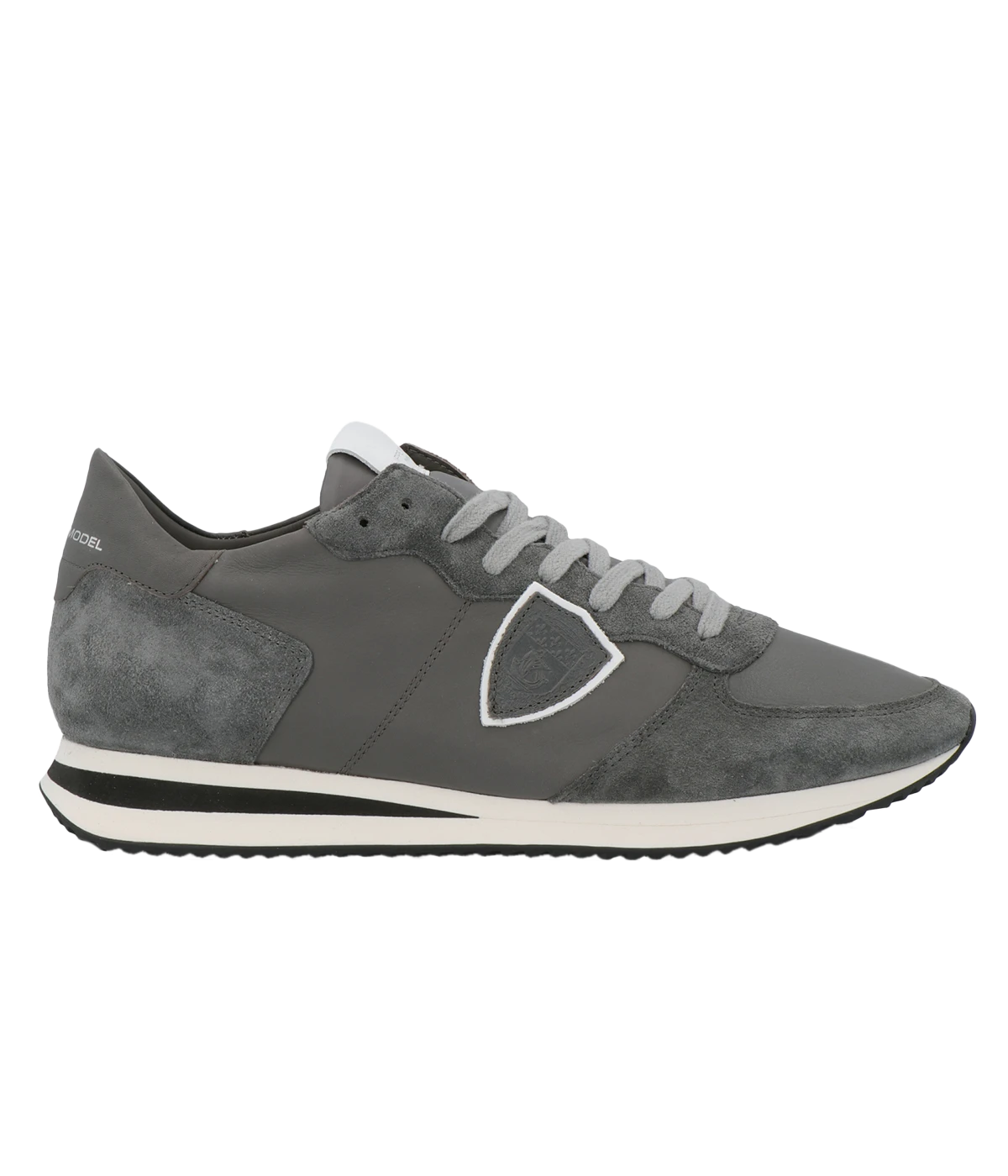 Side view of Philippe Model TRPX sneakers, showcasing their retro-inspired silhouette and modern treatments. The mix of premium materials and bold design elements make them ideal for stylish urban looks.