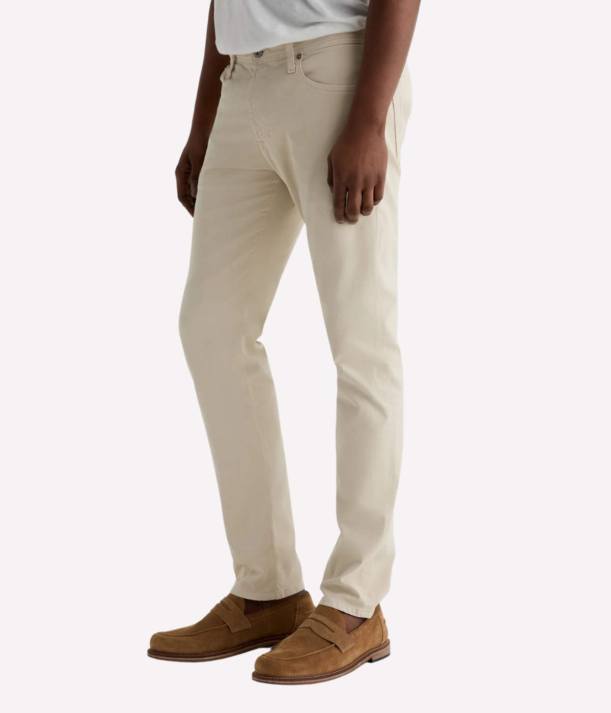 AG Tellis jeans in Natural Ivory, crafted from sueded stretch sateen with a slim fit, tapered leg, and soft brushed texture for elevated everyday wear.