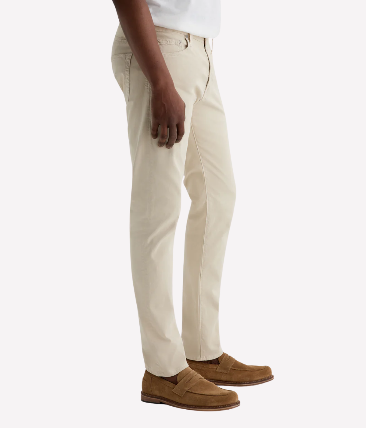 AG Tellis jeans in Natural Ivory, crafted from sueded stretch sateen with a slim fit, tapered leg, and soft brushed texture for elevated everyday wear.