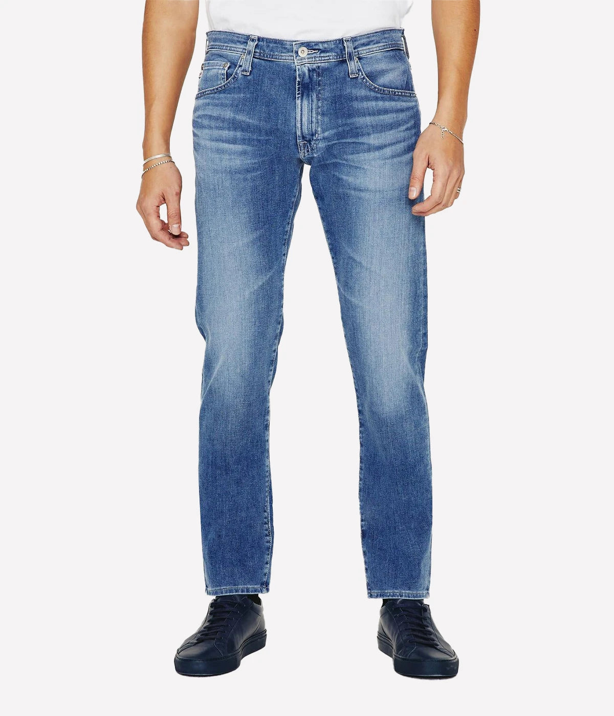 Slim jean for men in a feaded medium blue wash by AG.