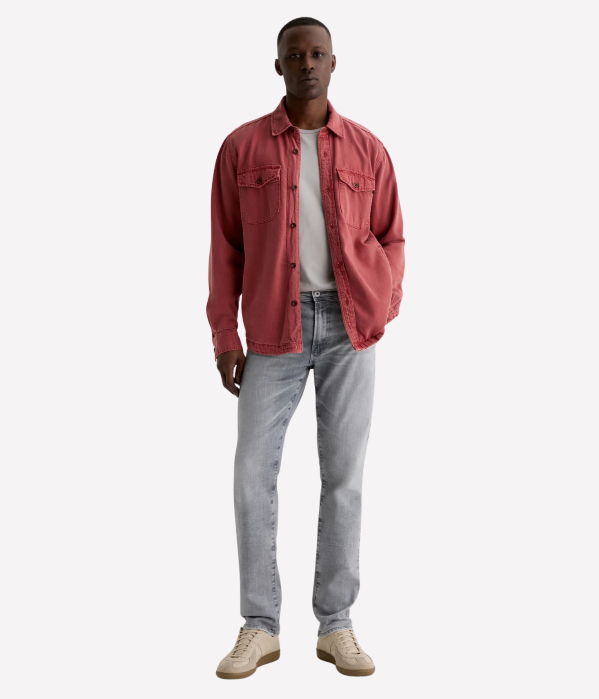 AG Tellis slim fit jeans in black Vapor Wash, made from stretch Italian denim with a tapered leg and sustainable finish.