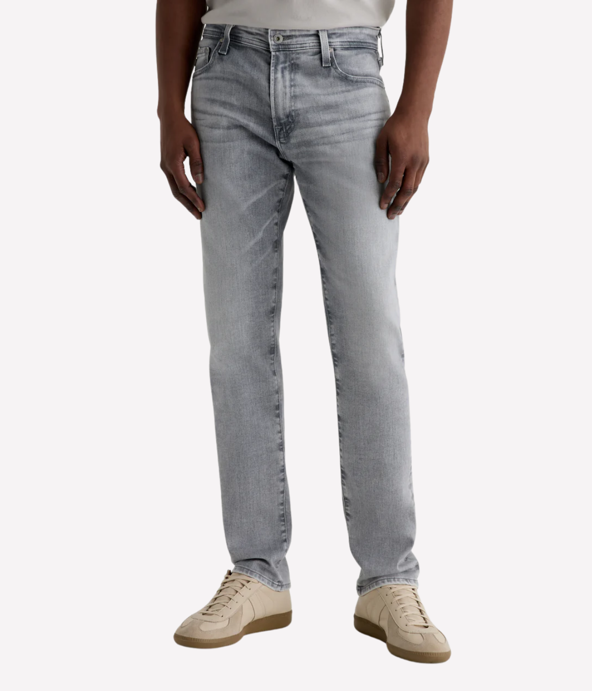 AG Tellis slim fit jeans in black Vapor Wash, made from stretch Italian denim with a tapered leg and sustainable finish.