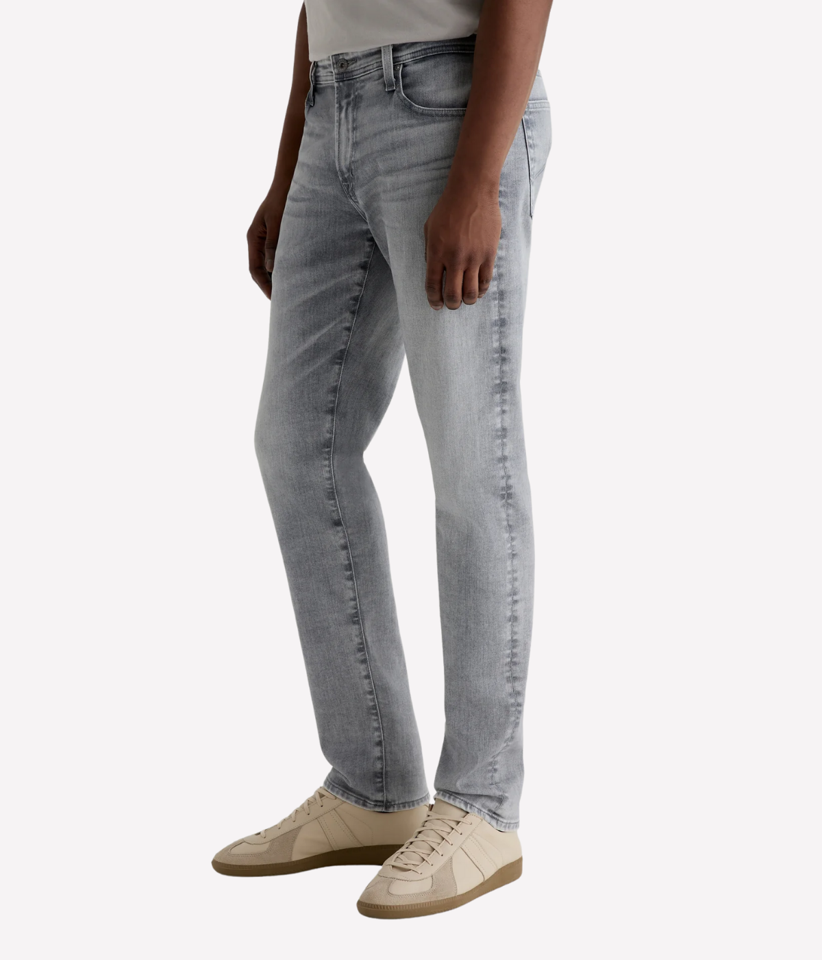 AG Tellis slim fit jeans in black Vapor Wash, made from stretch Italian denim with a tapered leg and sustainable finish.