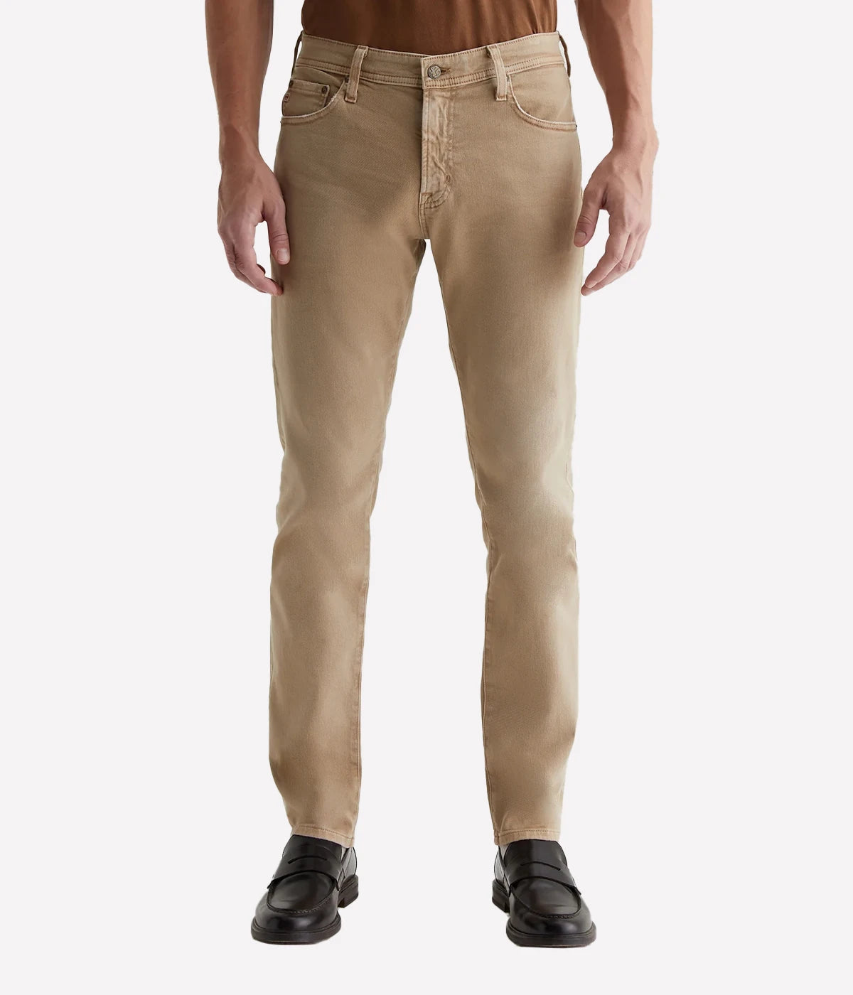 Sulfur-dyed khaki slim jeans for men, featuring a 7-year fade effect. Designed with a fitted upper block and tapered leg openings in 8.7 oz. Hyper Soft Bull Denim. The velvety fabric, part of the AG Cloud Soft Denim™ collection, offers dual-elastic stretch and a supple feel that softens with wear.