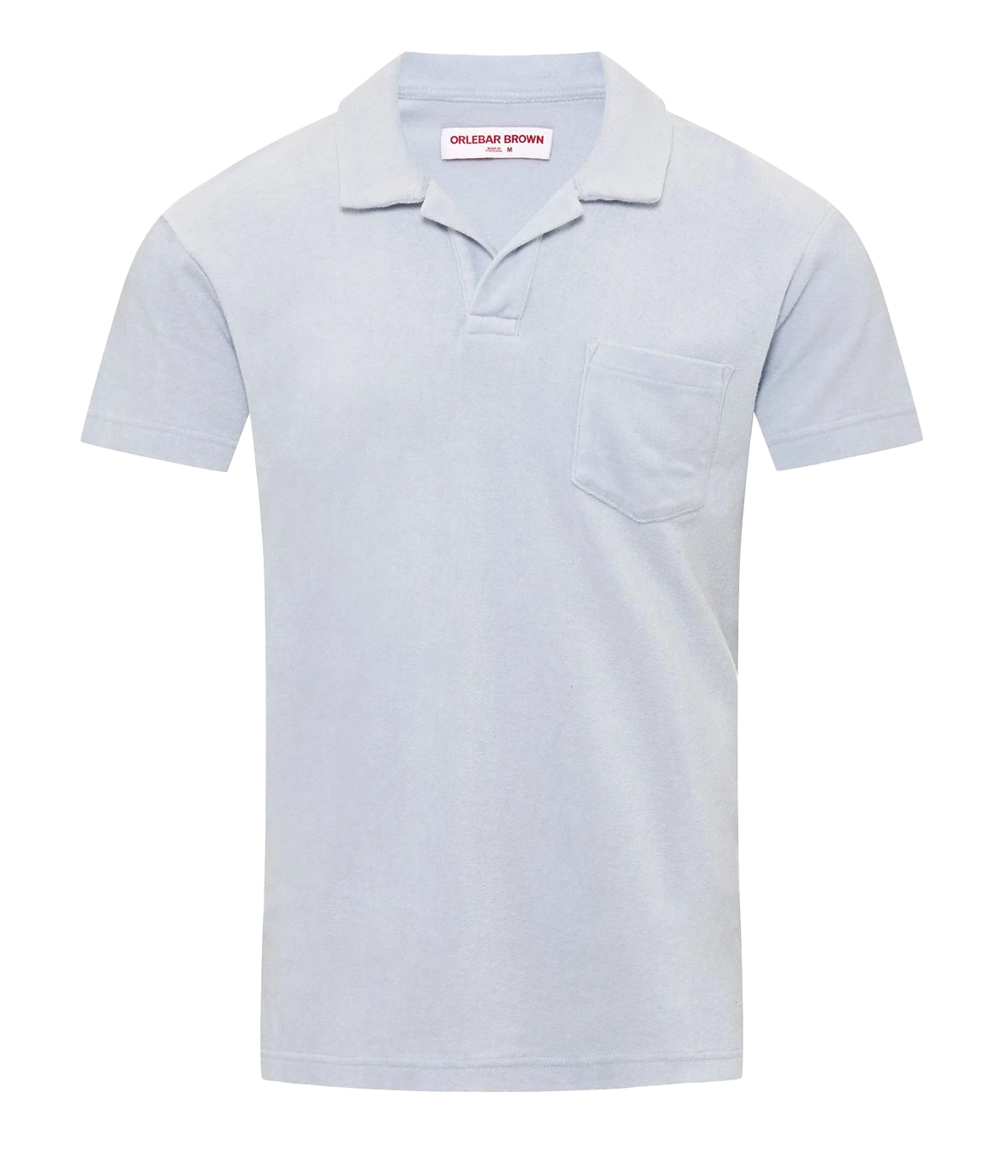 A short sleeve casual polo in a light baby blue colourway, featuring a terry towling fabric, collar detail and singular chest pocket. Beach to Bar, everyday polo, comfortable, holiday outfit.
