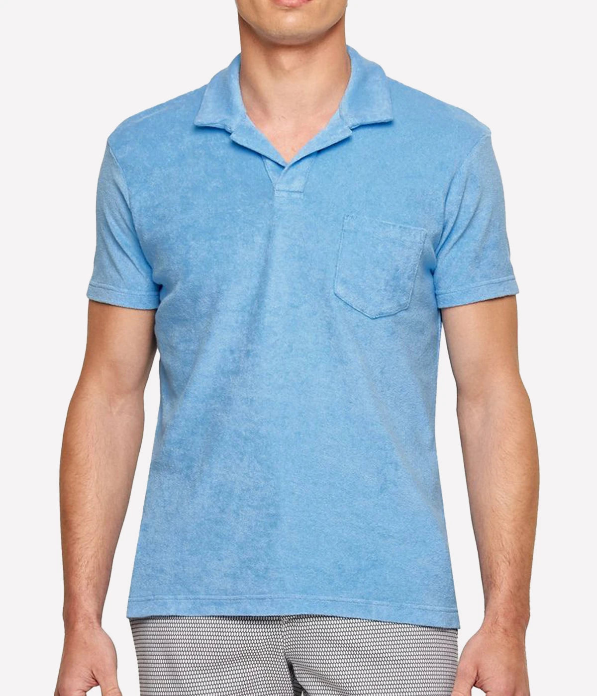 Front view of the Terry Towelling Polo, highlighting its sharp tailored fit, short sleeves, and open placket design.