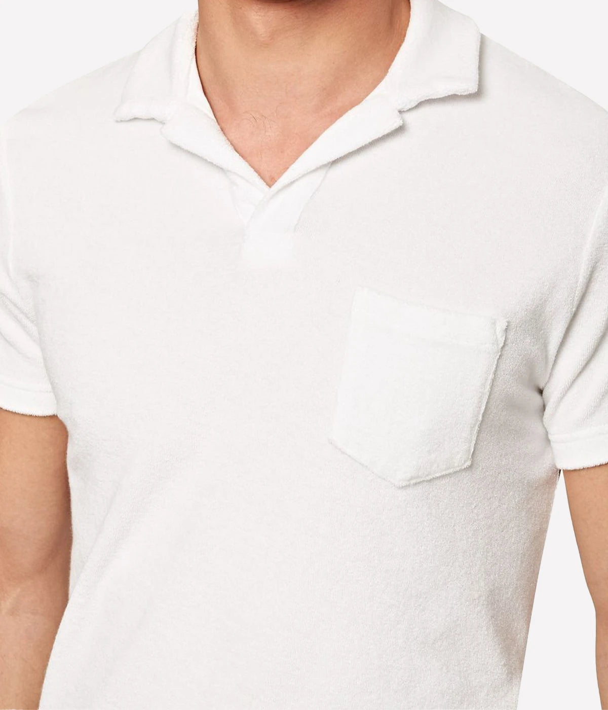 White terry towelling polo by Orlebar Brown, featuring a soft and breezy fabric with a stylish open placket. The tailored fit ensures comfort without being too snug, making it the perfect casual yet polished piece. Pair it with Orlebar Brown swim shorts for a complete holiday look. Made from 100% terry towelling cotton.