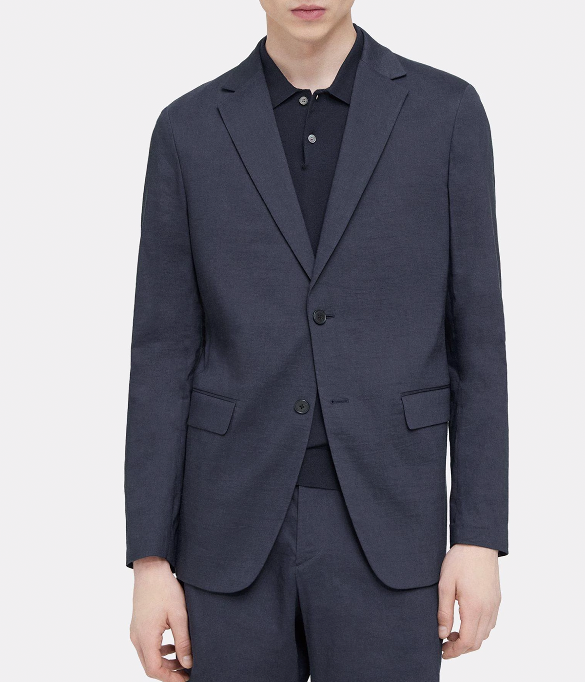 ALT text: Unstructured Blazer in stretch linen with two-button front, notch lapels, and flap pockets.