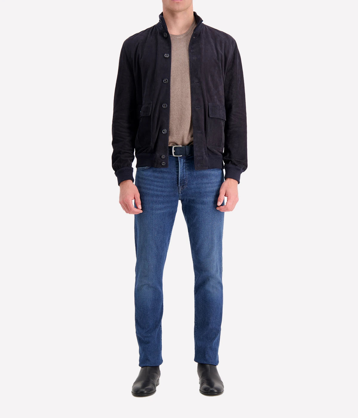 The Valstar Suede Jacket, a modern twist on the classic A1 flight jacket, featuring a luxurious goat suede texture and ribbed trims for a sporty yet sophisticated silhouette.