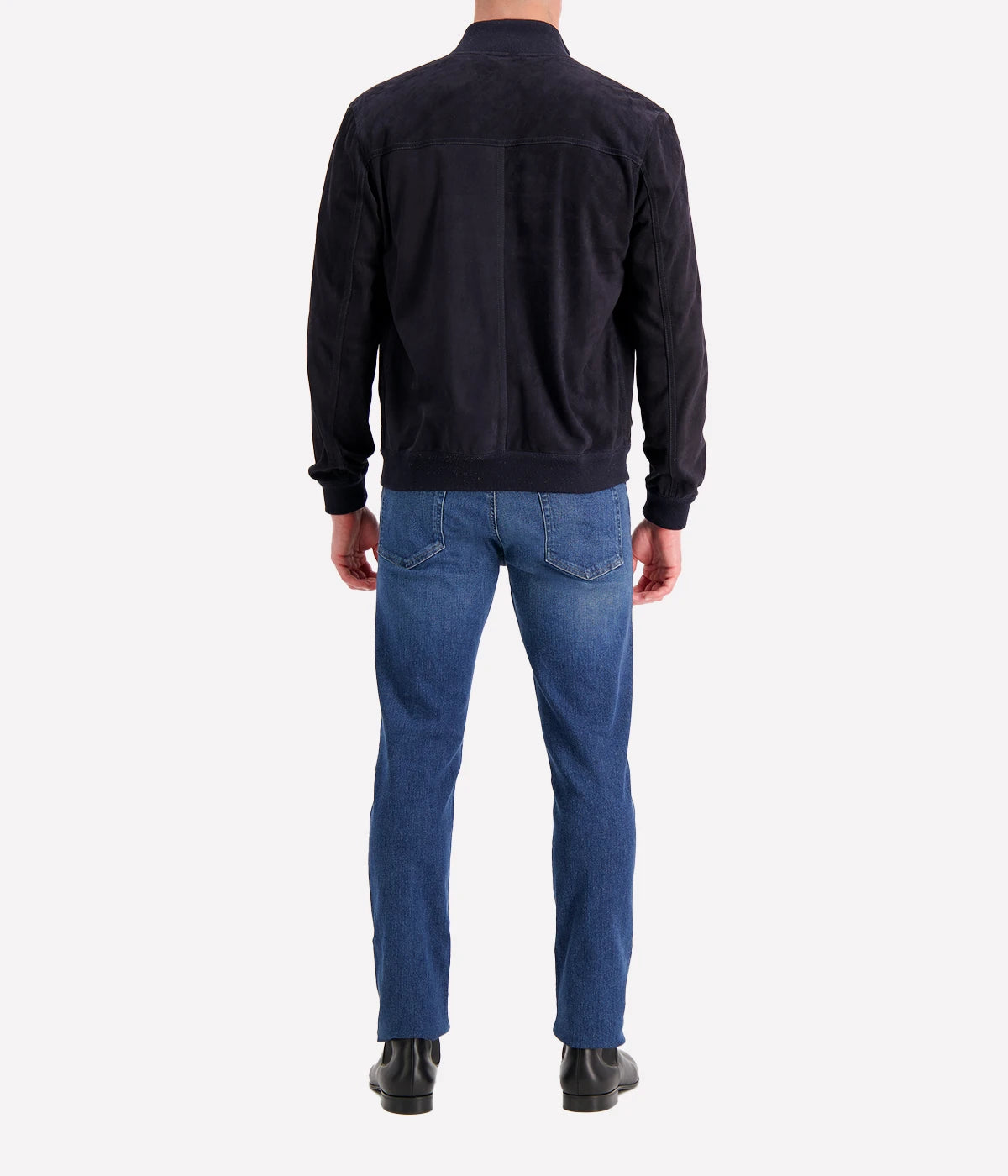 The Valstar Suede Jacket, a modern twist on the classic A1 flight jacket, featuring a luxurious goat suede texture and ribbed trims for a sporty yet sophisticated silhouette.