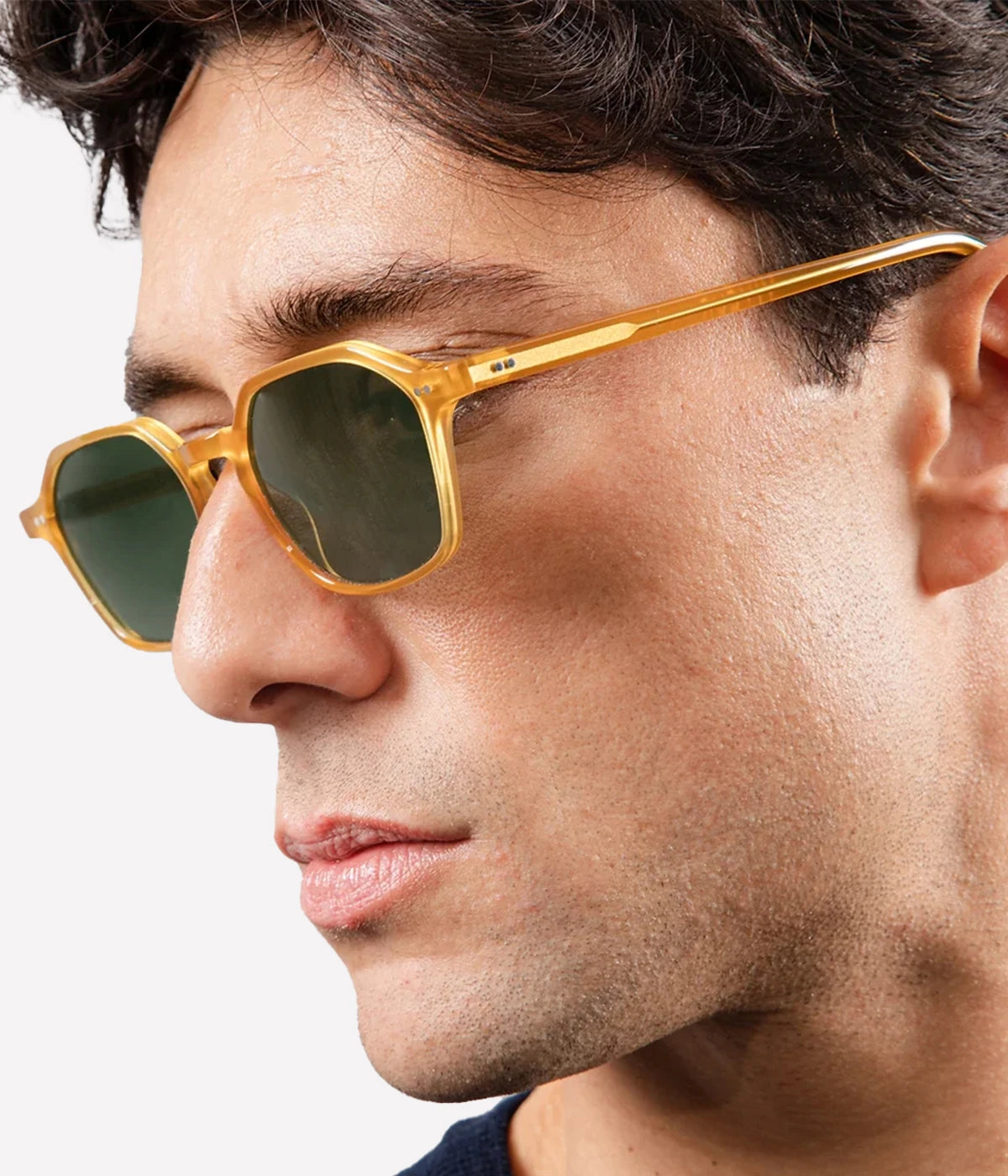Velasca sunglasses in Yellow & Green, handcrafted in Italy from Mazzucchelli acetate. Featuring square frames, anti-reflective lenses, and 100% UV protection for a bold yet refined look.
