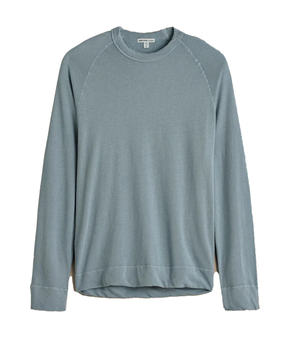 James Perse Vintage French Terry Sweatshirt in lightweight Supima cotton terry, featuring a crew neckline, full-length raglan sleeves, and a relaxed fit. Garment-dyed for a soft, lived-in feel, with self-fabric cuffs and hem for a clean, minimal look.