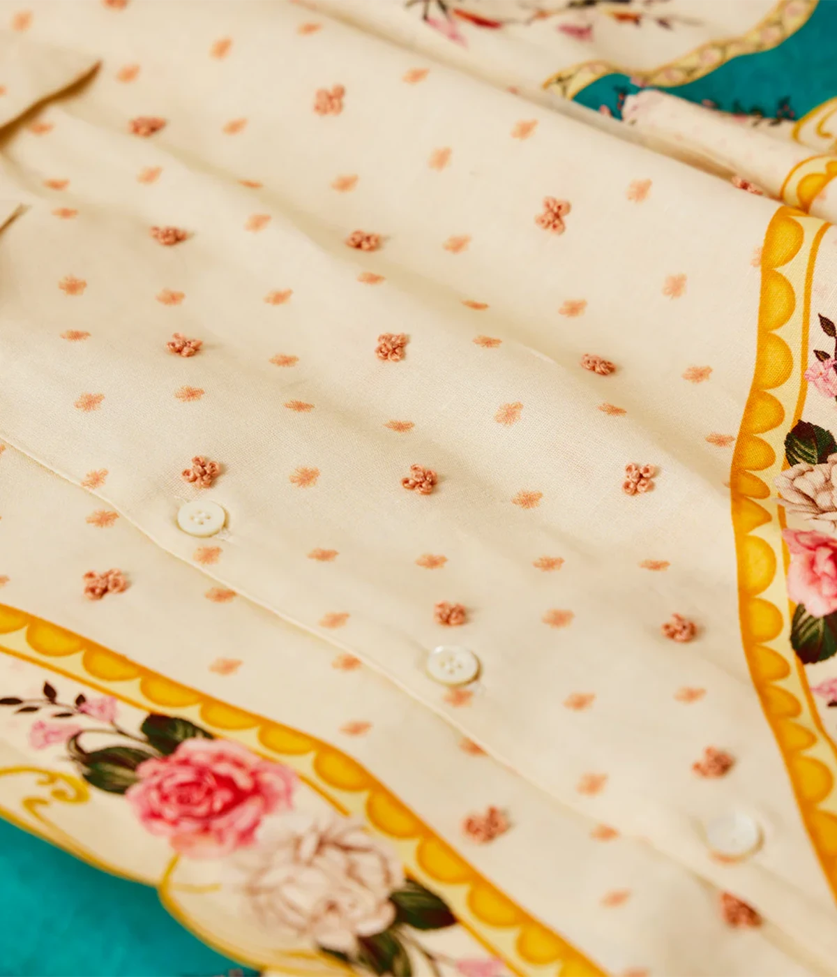 Perte D’ego Vintage Plates Emb Shirt featuring a Cuban collar, relaxed fit, and a baroque-inspired floral print in cotton-linen blend. Detailed with hand-embroidered accents and finished with Mother of Pearl buttons for a refined, statement summer look.