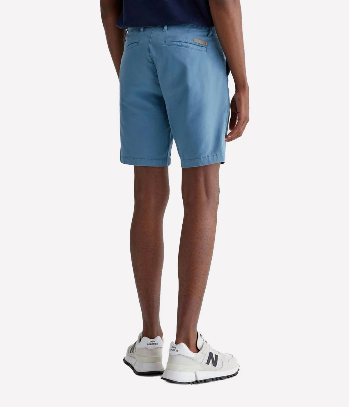 Back view of the AG Wanderer Shorts for men, featuring tailored back pockets and a streamlined, polished silhouette.