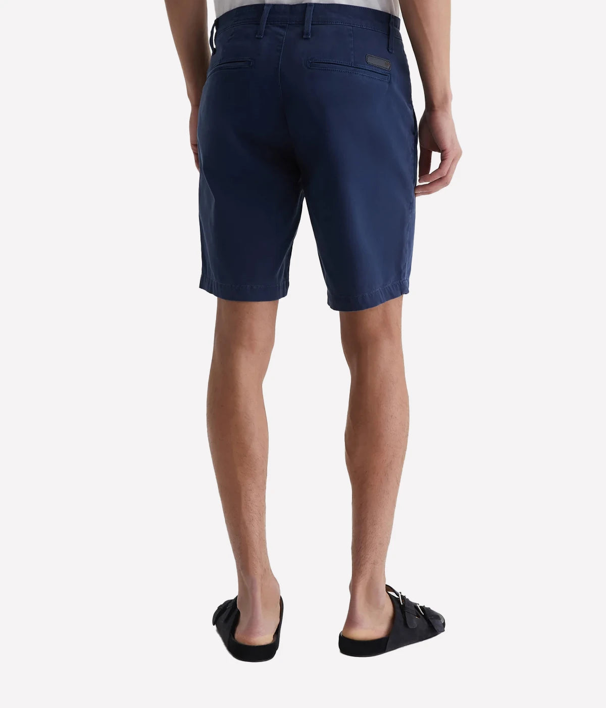Back view of the AG Wanderer Shorts for men, featuring tailored back pockets and a streamlined, polished silhouette.