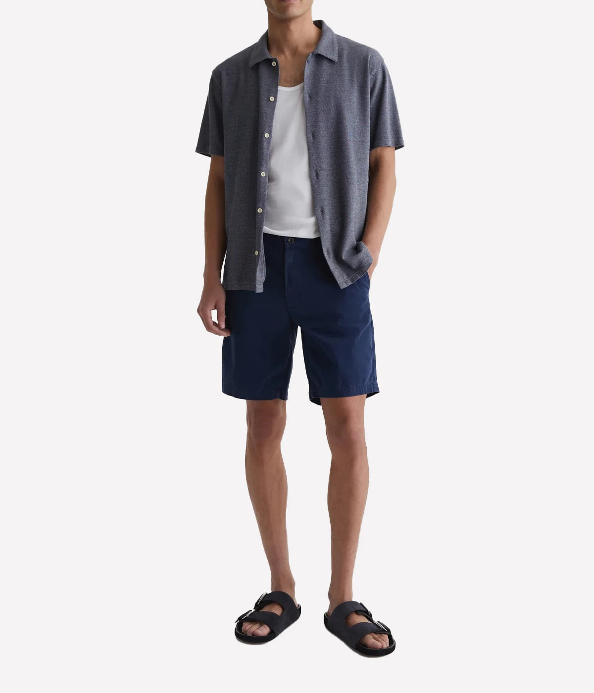 AG Wanderer Shorts styled with a short-sleeve shirt and sandals, showcasing a relaxed yet polished outfit for versatile, warm-weather wear.