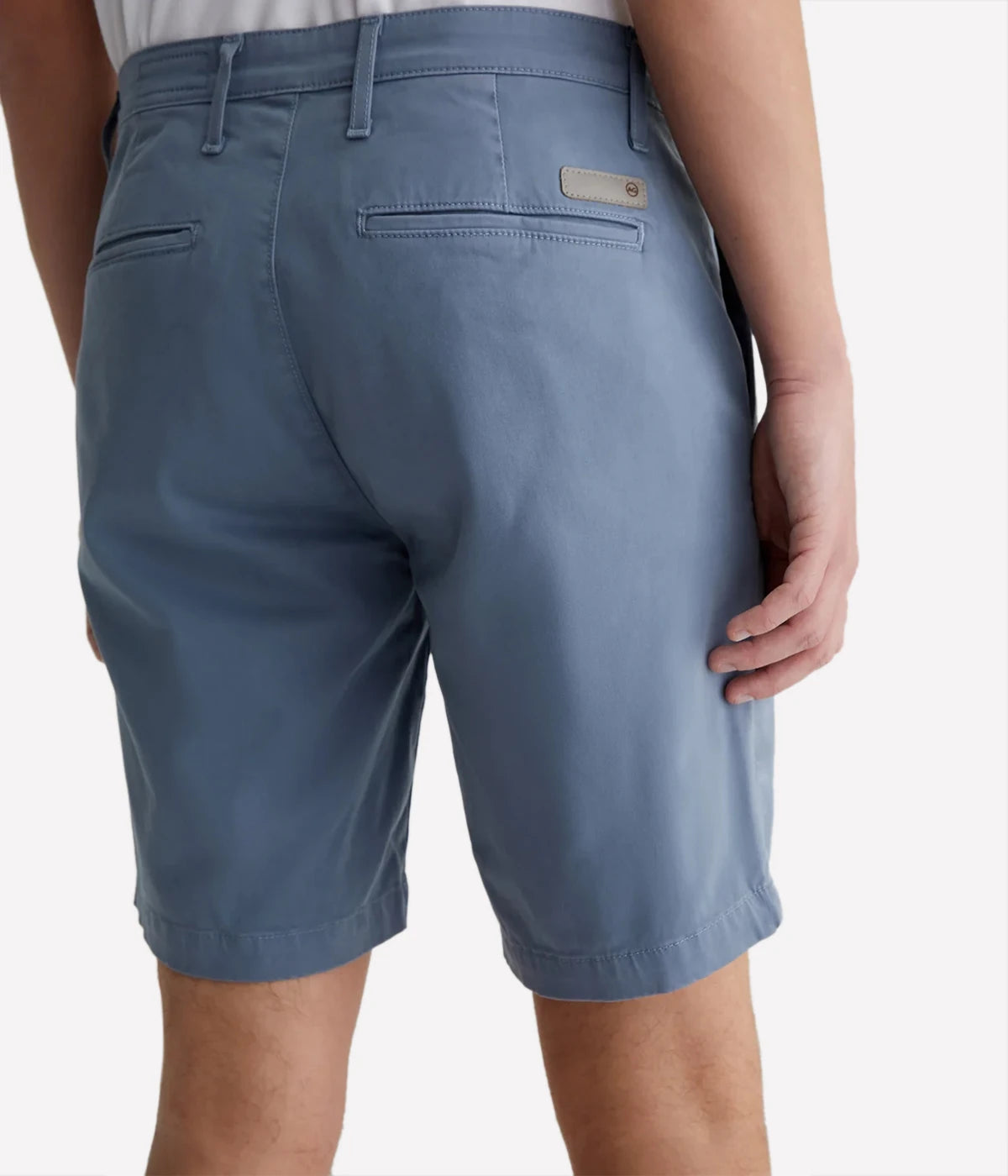 Back view of the AG Wanderer Shorts for men, featuring tailored back pockets and a streamlined, polished silhouette.