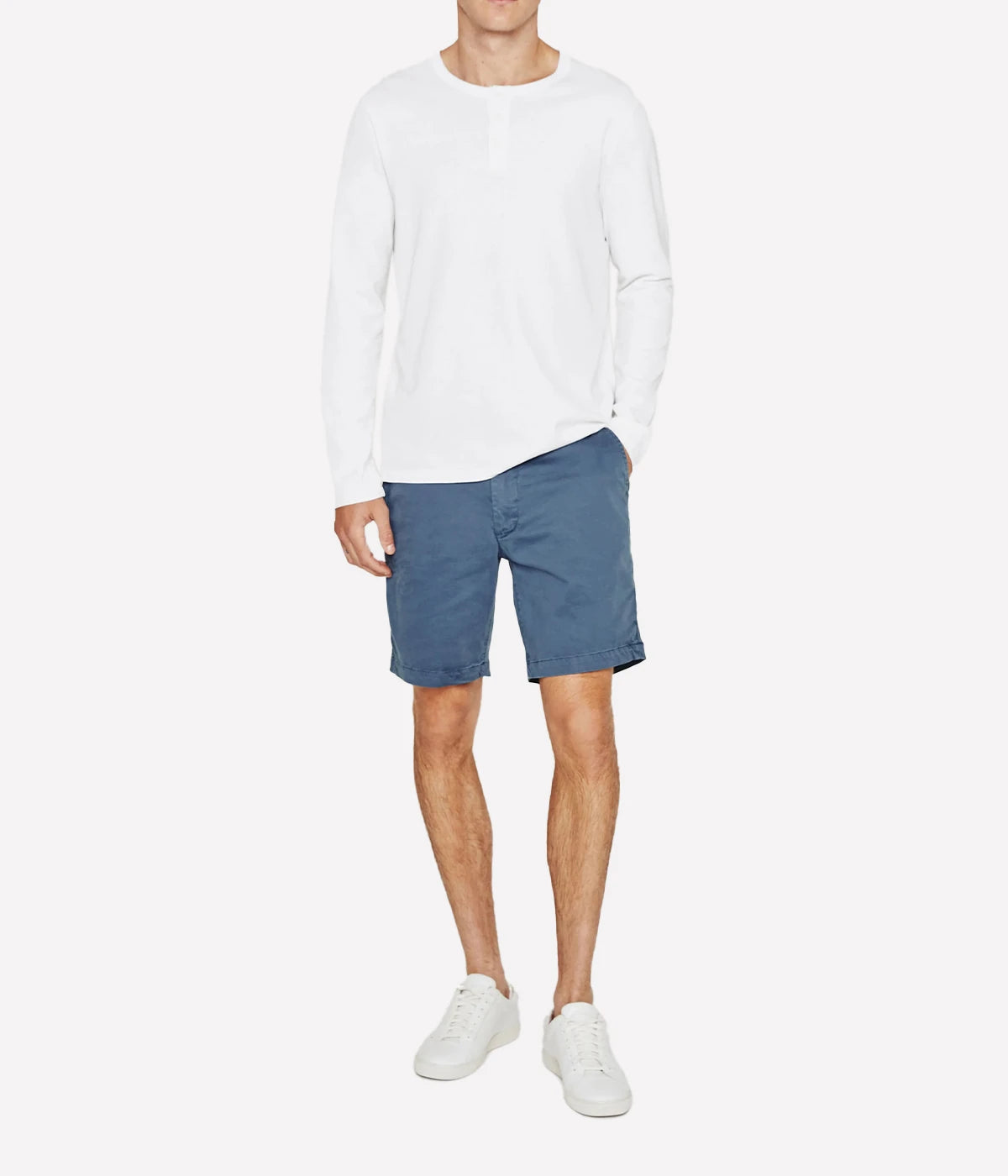 AG Wanderer Shorts styled with a long-sleeve shirt and sneakers, showcasing a relaxed yet polished outfit for versatile, everyday wear.