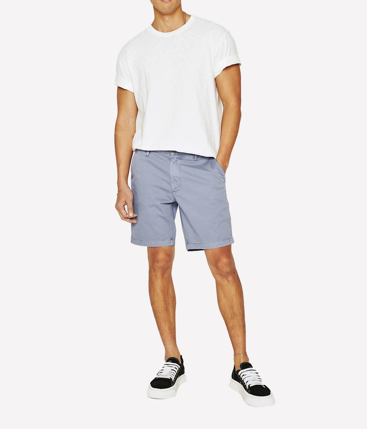 AG Wanderer Shorts styled with a short-sleeve shirt and sneakers, showcasing a relaxed yet polished outfit for versatile, warm-weather wear.