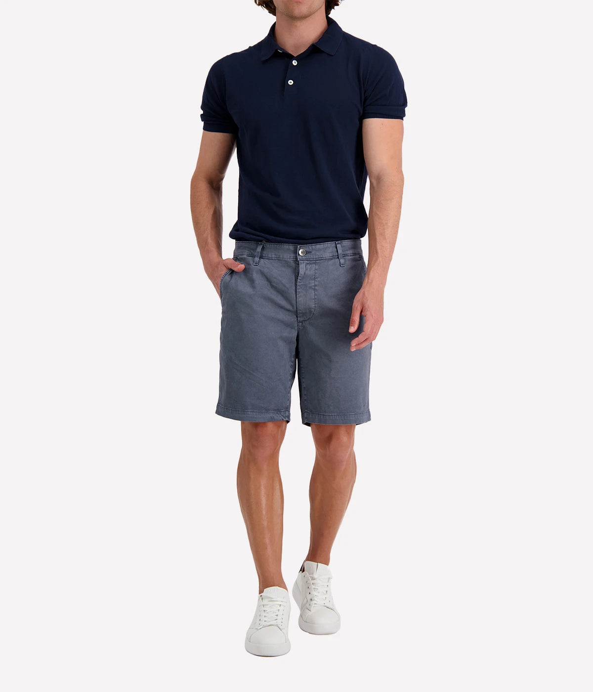 AG Wanderer Shorts styled with a short-sleeve polo shirt and sneakers, showcasing a relaxed yet polished outfit for versatile, everyday wear.