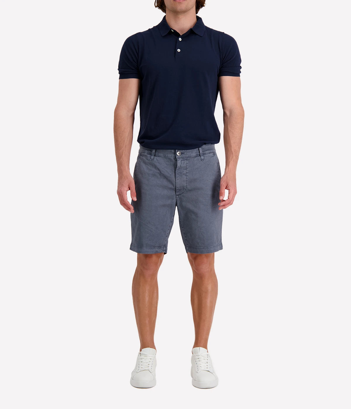 AG Wanderer Shorts styled with a short-sleeve polo shirt and sneakers, showcasing a relaxed yet polished outfit for versatile, everyday wear.