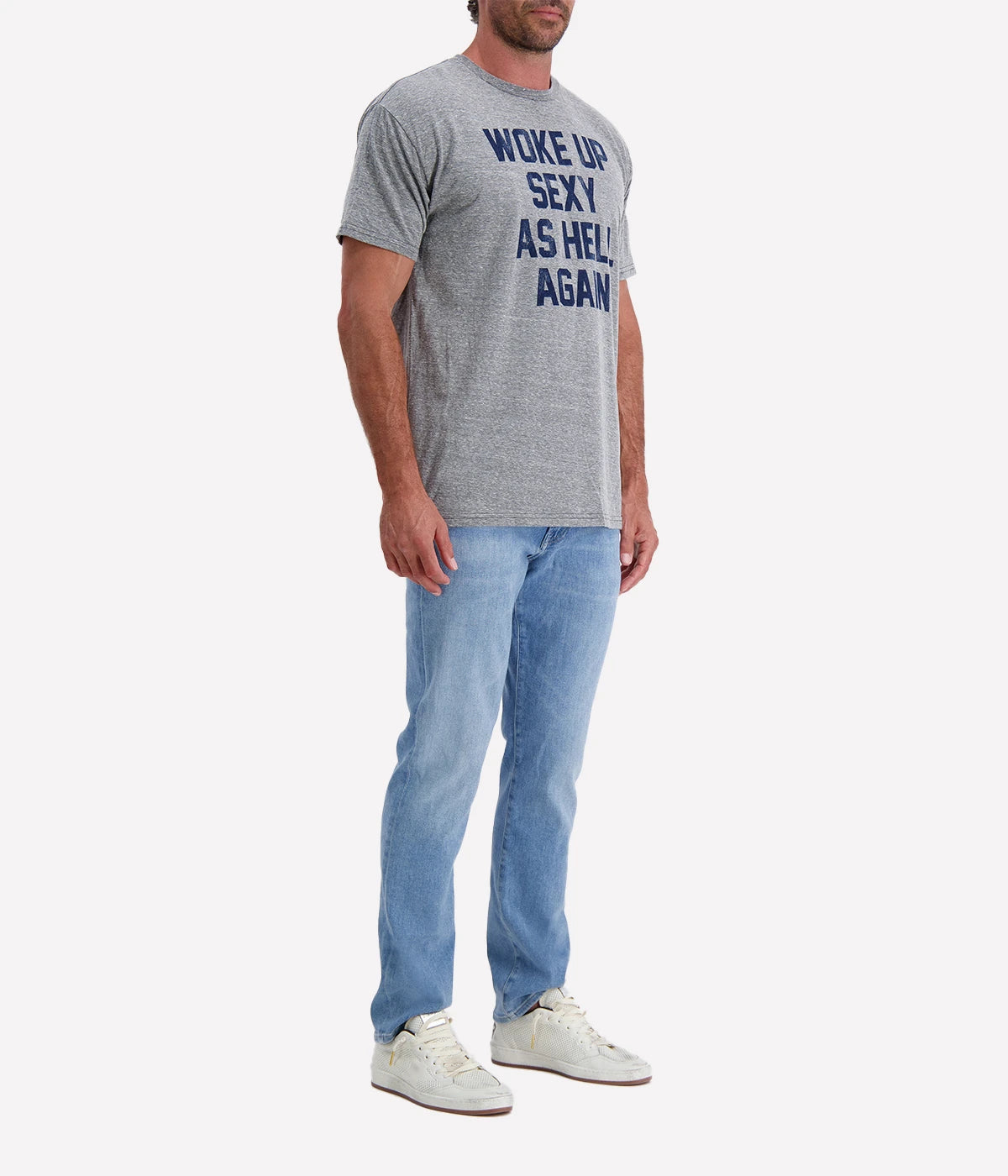 Front view of the "Woke Up Sexy" graphic tee, featuring a retro-inspired design on a soft, lightweight fabric blend. The relaxed fit and vintage-style lettering make this the perfect statement piece for effortless, everyday style.