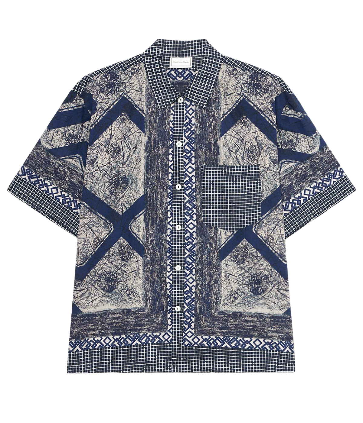 Short-sleeved cotton shirt featuring navy and cream patchwork design with chevron, grid, and abstract patterns, chest pocket, and relaxed fit.