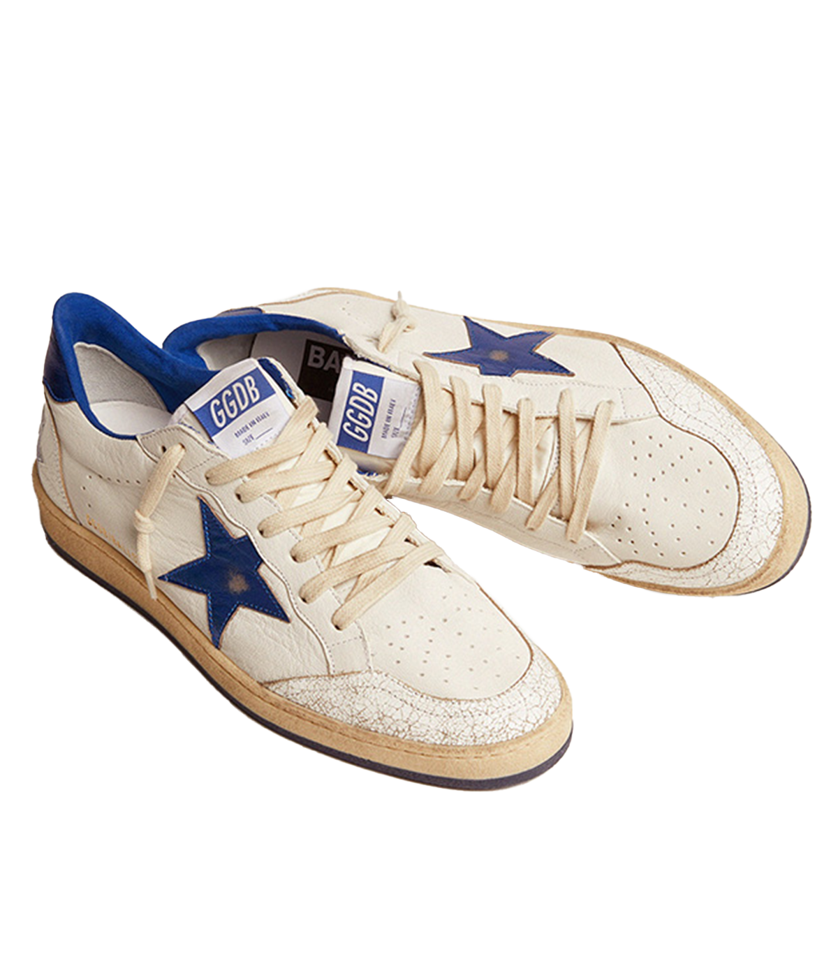 Golden Goose Ball Star sneakers channel an '80s American college and basketball vibe. Crafted in white nappa leather, they feature a metallic navy leather star and heel tab, along with white crackle-leather inserts. The sneakers are completed with white laces, giving them a vintage-inspired look with modern appeal.