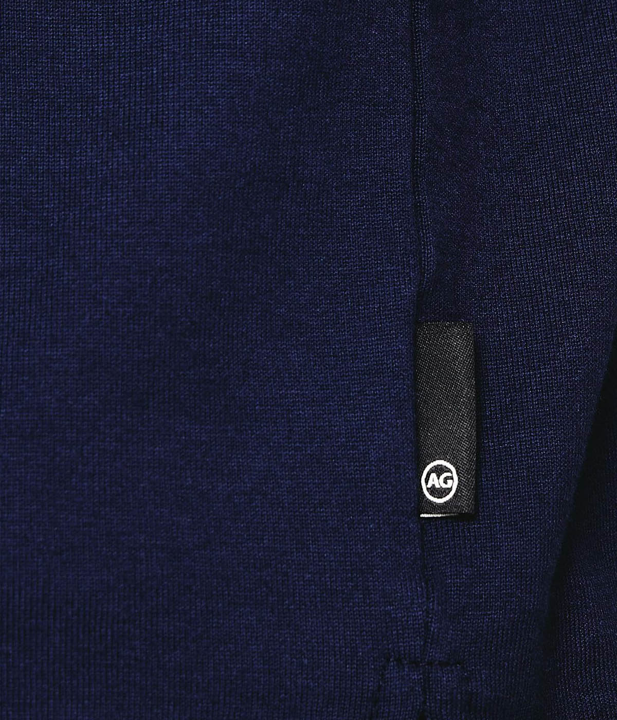 Close-up of the Bryce Johnny Collar polo shirt, focusing on the finely crafted collar and soft texture of the cotton fabric.