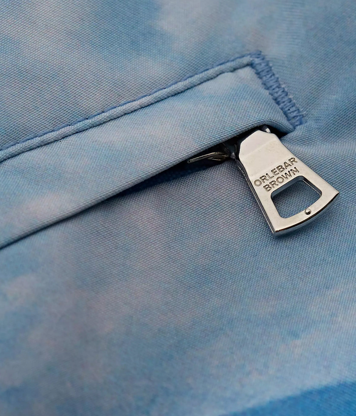 Detailed shot of the Slim Aarons Roc Pool II photographic print in shades of blue, adding a luxurious, iconic touch to the Bulldog Swim Shorts.