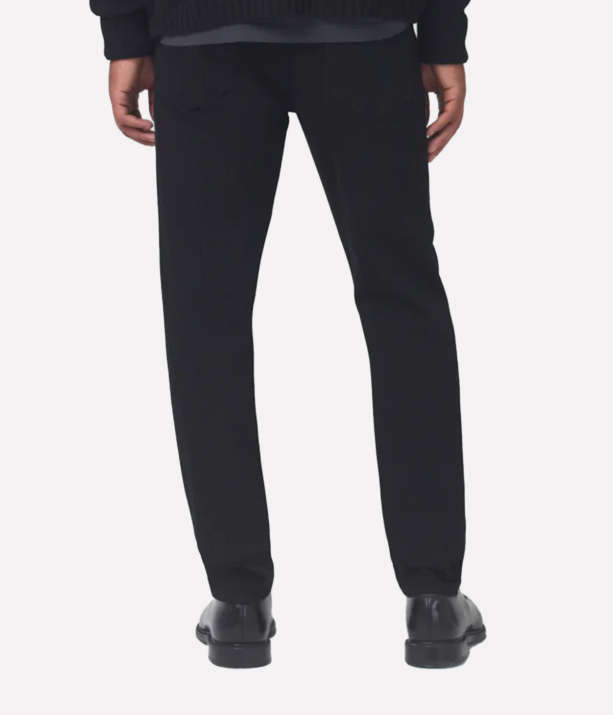 Back view of the jeans, featuring the signature Citizens of Humanity stitching on the pockets and sleek tapered leg.