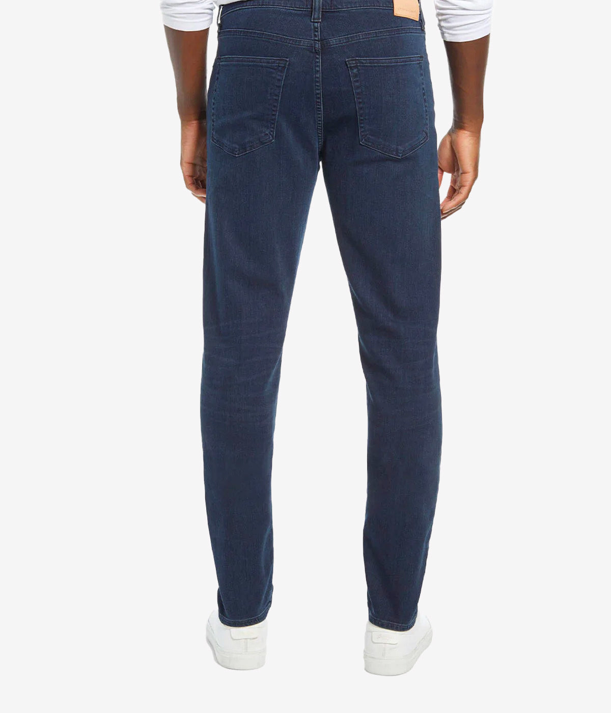 Back view of the jeans, featuring the signature Citizens of Humanity stitching on the pockets and sleek tapered leg.