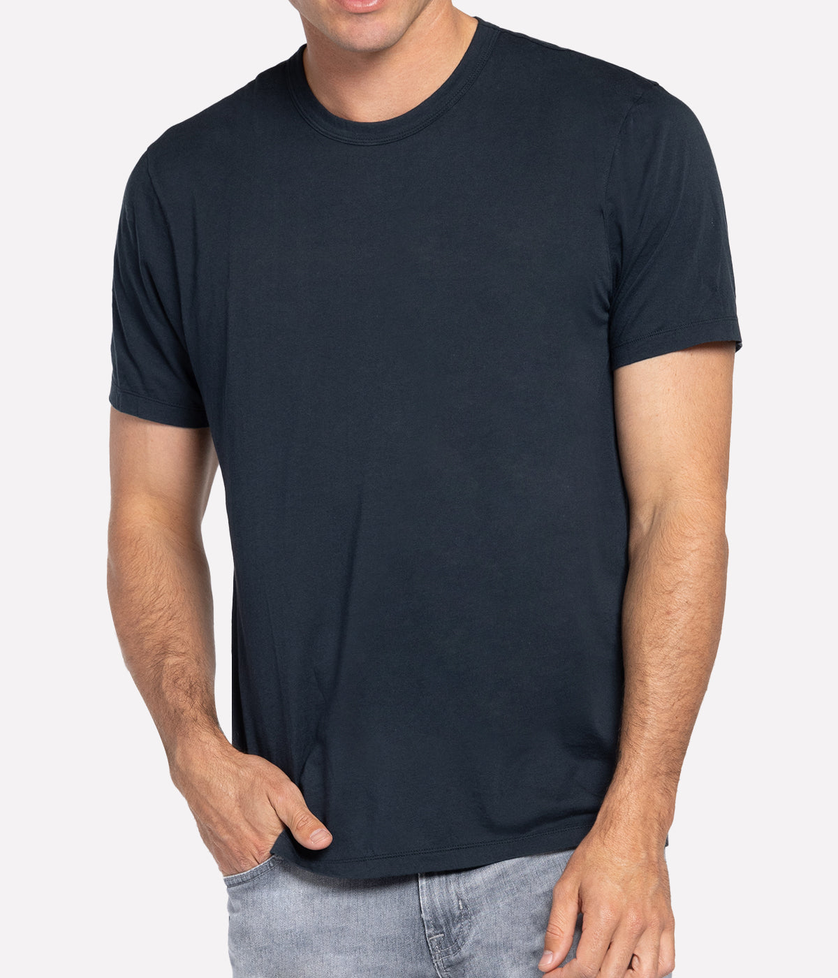 Front view of the James Perse Luxe Lotus Jersey Crew Neck T-Shirt in French Navy, crafted from a luxurious 100% cotton fabric with a smooth, satin-like finish. The shirt features a classic crew neck, short sleeves, and a clean, straight hem for a polished, versatile look.