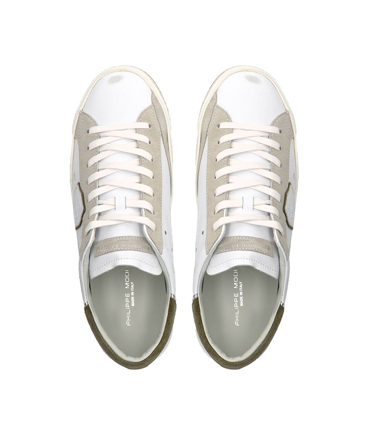 Top view of Philippe Model PRSX Low Man sneakers, highlighting the worn-effect white screen-printed laces and the vintage-used effect on the calfskin and suede upper. The 2.5 cm high brushed rubber sole with a vintage effect is visible.