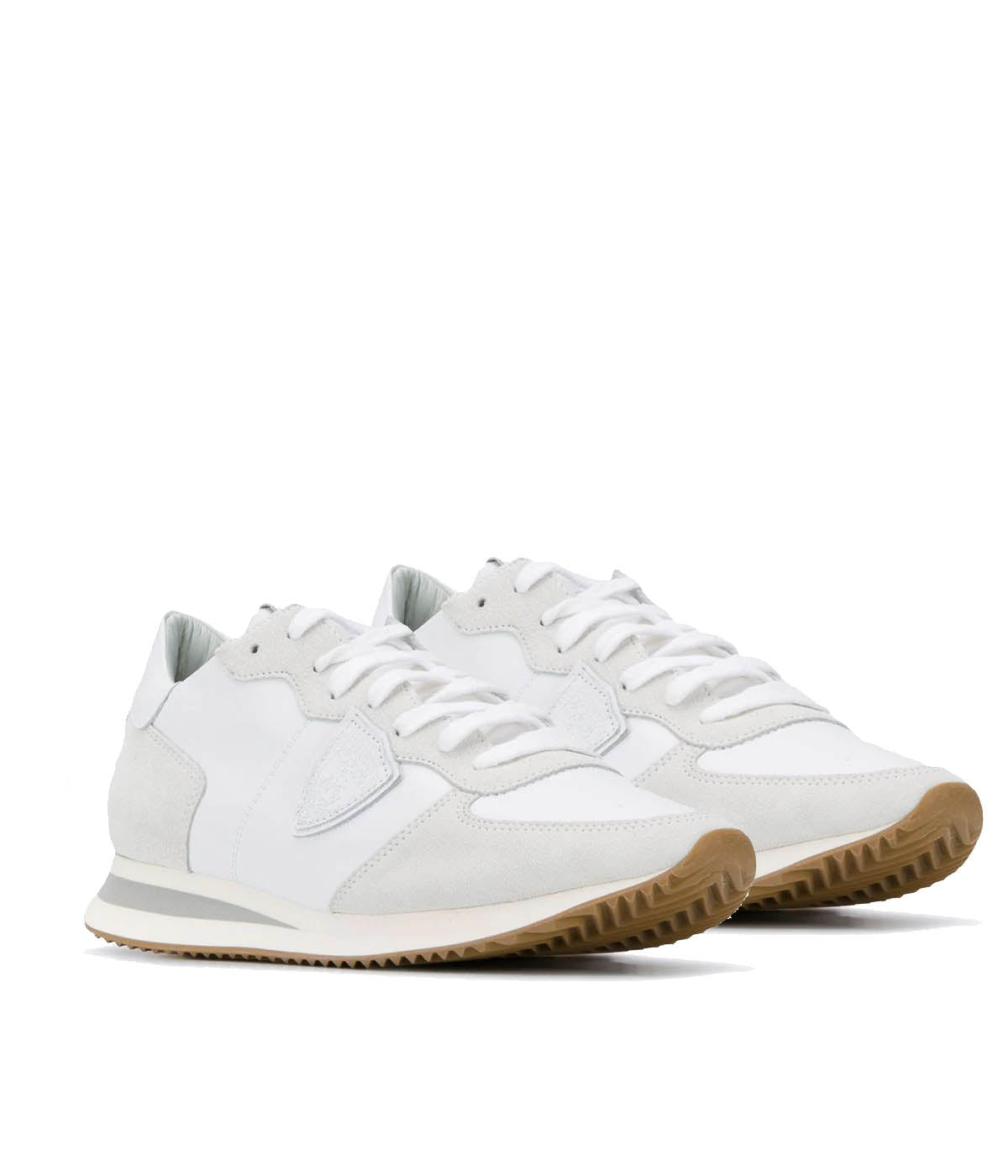 Front view of Philippe Model TRPX sneakers, featuring a sporty yet metropolitan design inspired by ‘70s running styles. Handcrafted in Italy with contemporary materials, these sneakers combine vibrant tones and urban glamour.