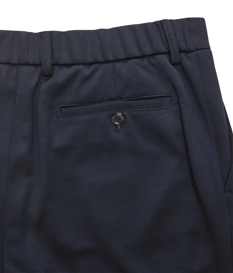 Close-up of Marco Pescarolo Evo Wool Trouser in Navy showing the back pocket with button