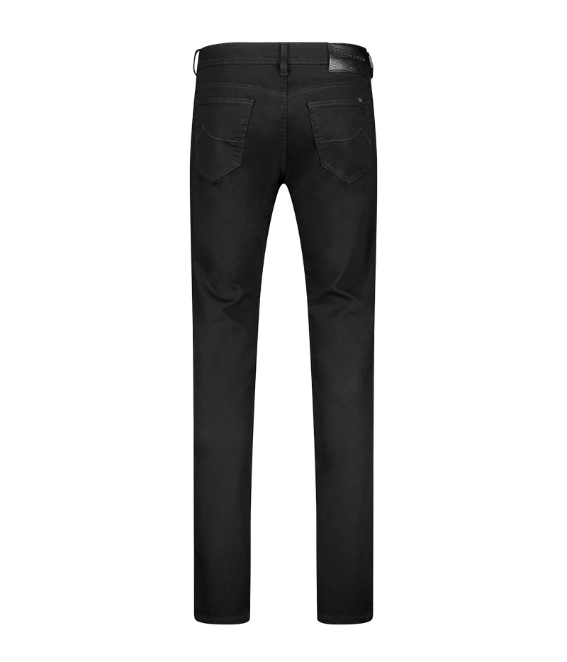 Black slim-fit jeans shown from the back, featuring a belt loop, two rear patch pockets, and a button closure, photographed on a solid white background.
