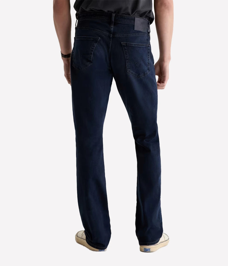 Man wearing AG Graduate Jean in Studio, back view