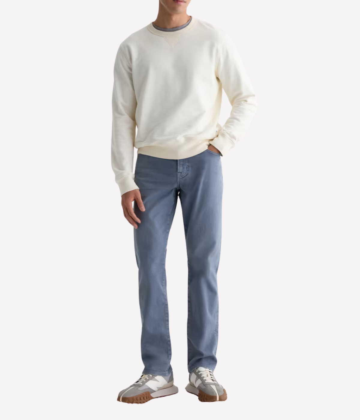 AG Everett Jean in 7 Years Sulfur Ashline worn on model - full length front view. 