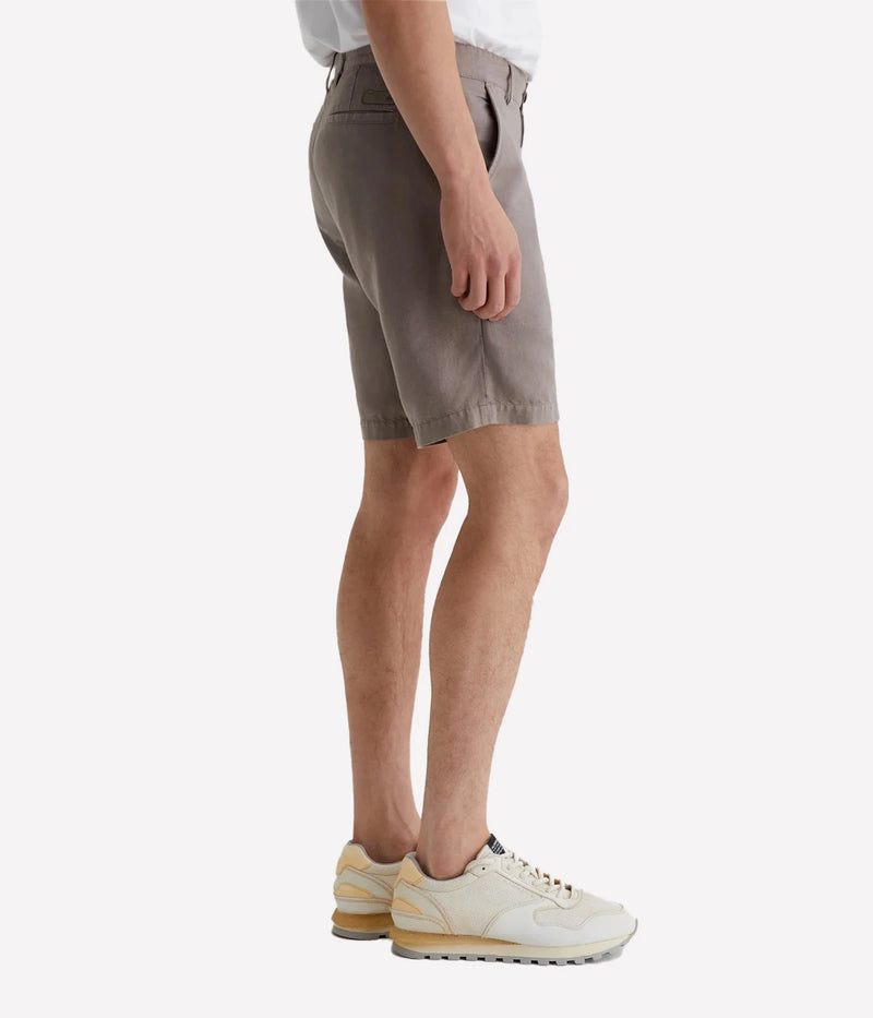AG Wanderer Shorts in Amber Dust, slim-fit men's shorts with a tapered leg opening, crafted from a breathable linen-cotton blend for all-day comfort. Made in USA.