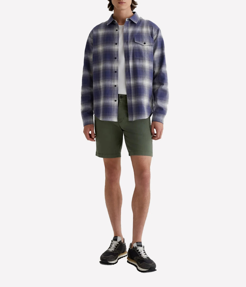 AG Wanderer Slim Fit Shorts in Sulfur Seaside Sage, featuring a sharp trouser look with a tapered leg opening. Made from ultra-lightweight cotton blend fabric for comfort. Material: 97.5% Cotton, 2.5% Elastane. Made in USA.