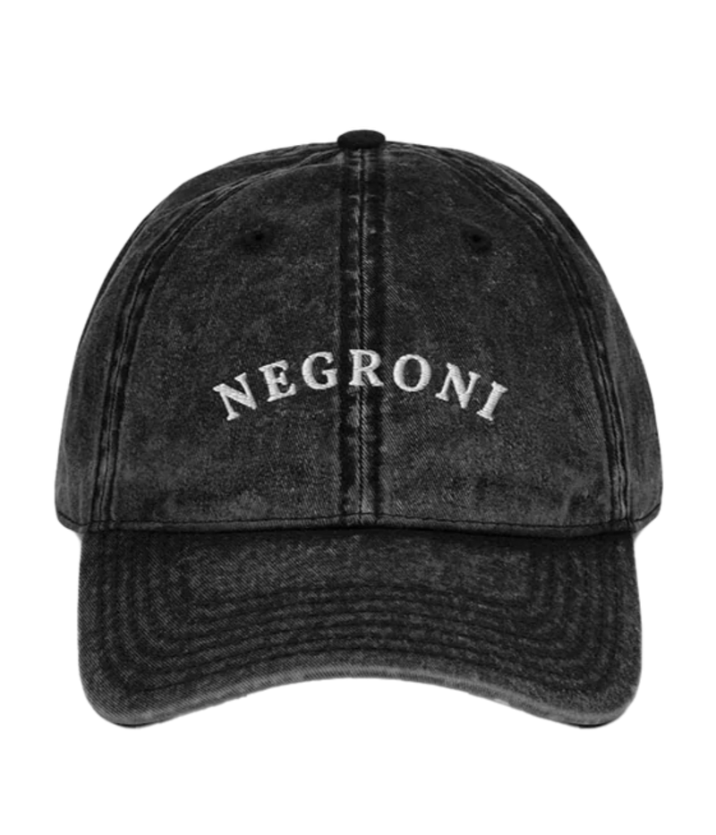 Black cap with 'NEGRONI' embroidery on a white background