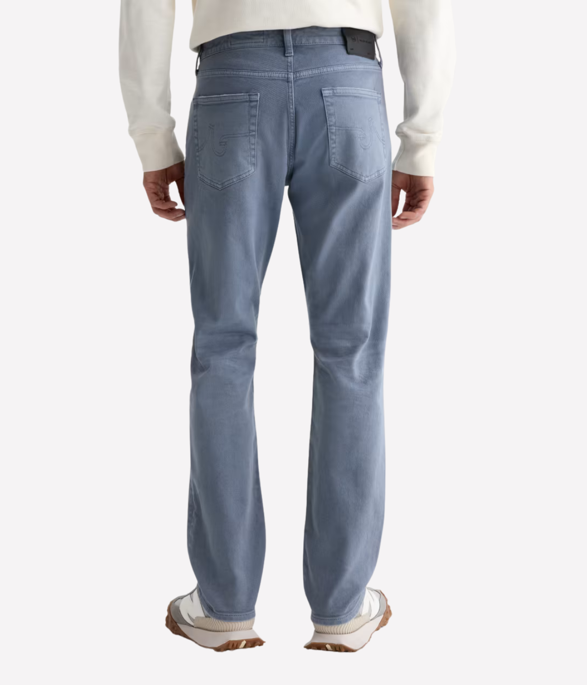 AG Everett Jean in 7 Years Sulfur Ashline worn on model - back view. 
