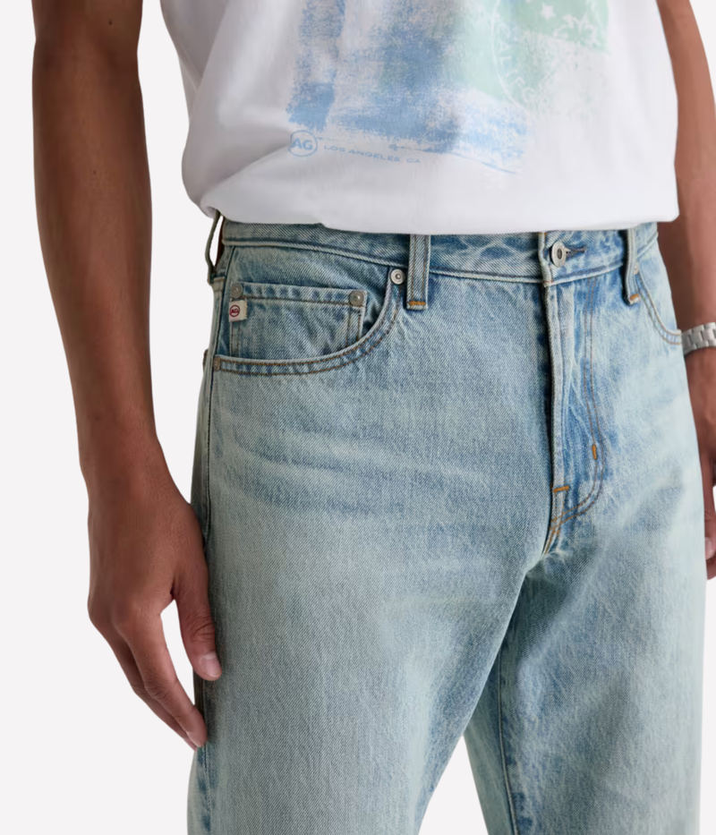 AG Everett Jean in 7 Years Sulfur Ashline worn on model - close up on waistband